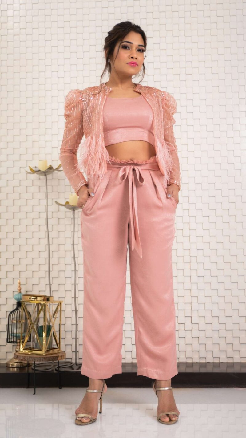 A beautiful hand embroidery jacket teamed with a crop top n pleated straight loose fit pants